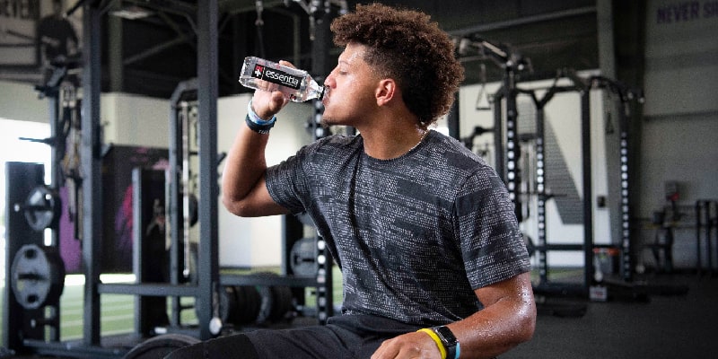 Patrick Mahomes drinking Essentia Water after a workout