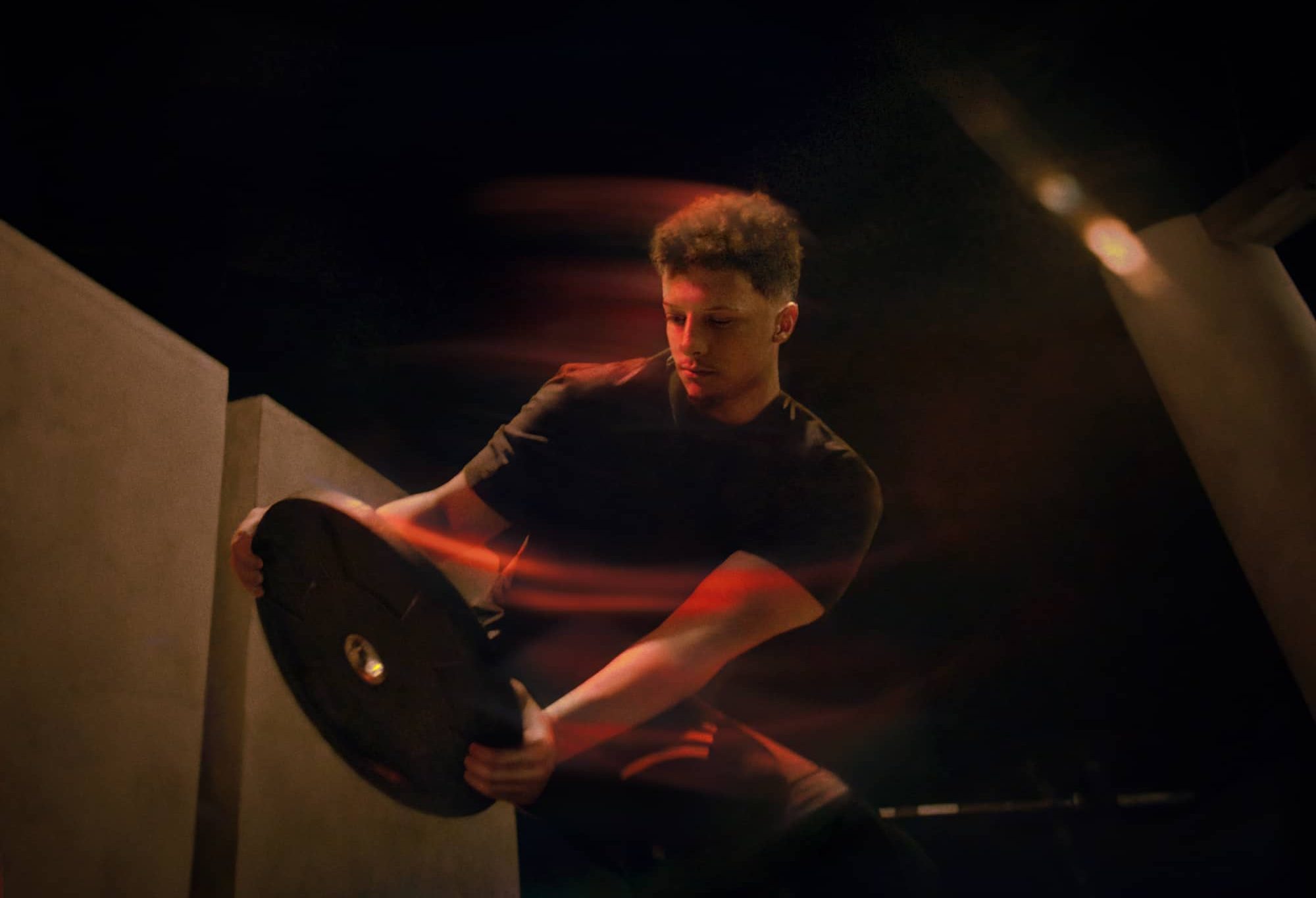 Patrick Mahomes lifting weights