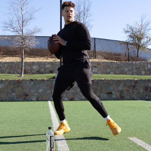 Patrick Mahomes about to throw a football