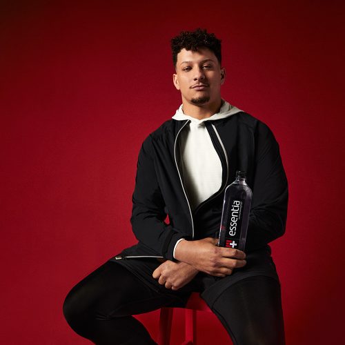 Patrick Mahomes with an Essentia Water bottle
